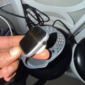 Sleek Gray Apple Smartwatch with Perforated Strap series 4 with box and charger